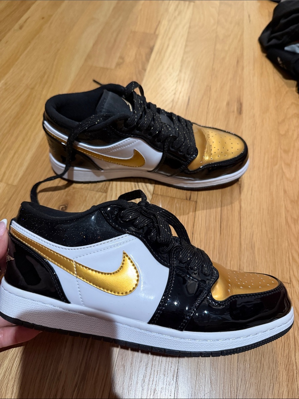 Nike Low-Top Sneakers in Black, White & Gold